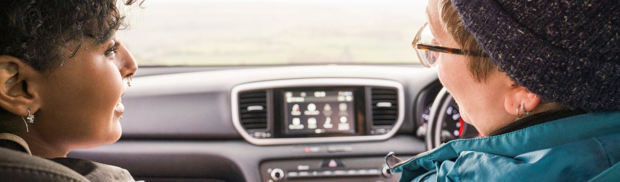 Two friends in a car