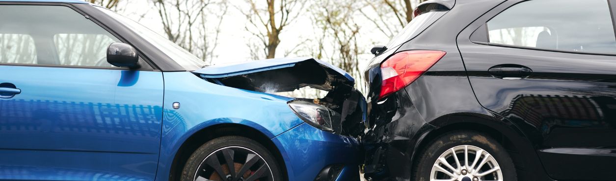 Car crash with car driving into back of a car